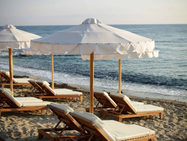 Mitsis Selection Laguna Hersonissos  Esterno foto Beach chairs and umbrella